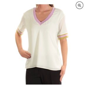 White short sleeve blouse with pop of color along the collar